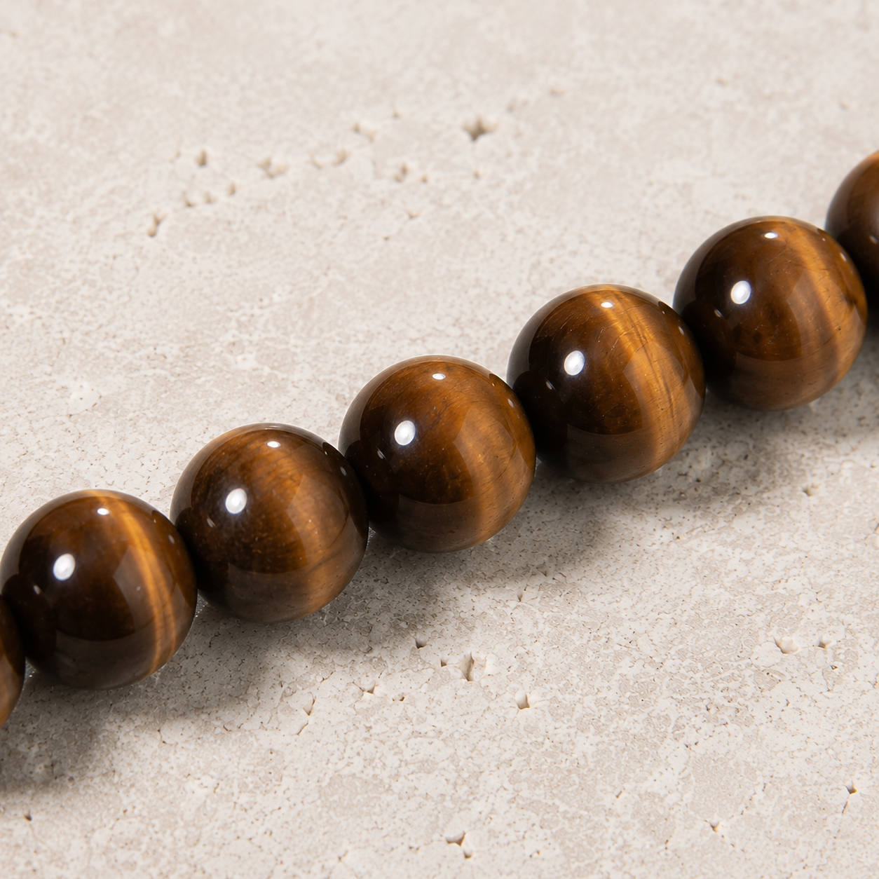 Natural tiger's eye bead macro texture Taeshine